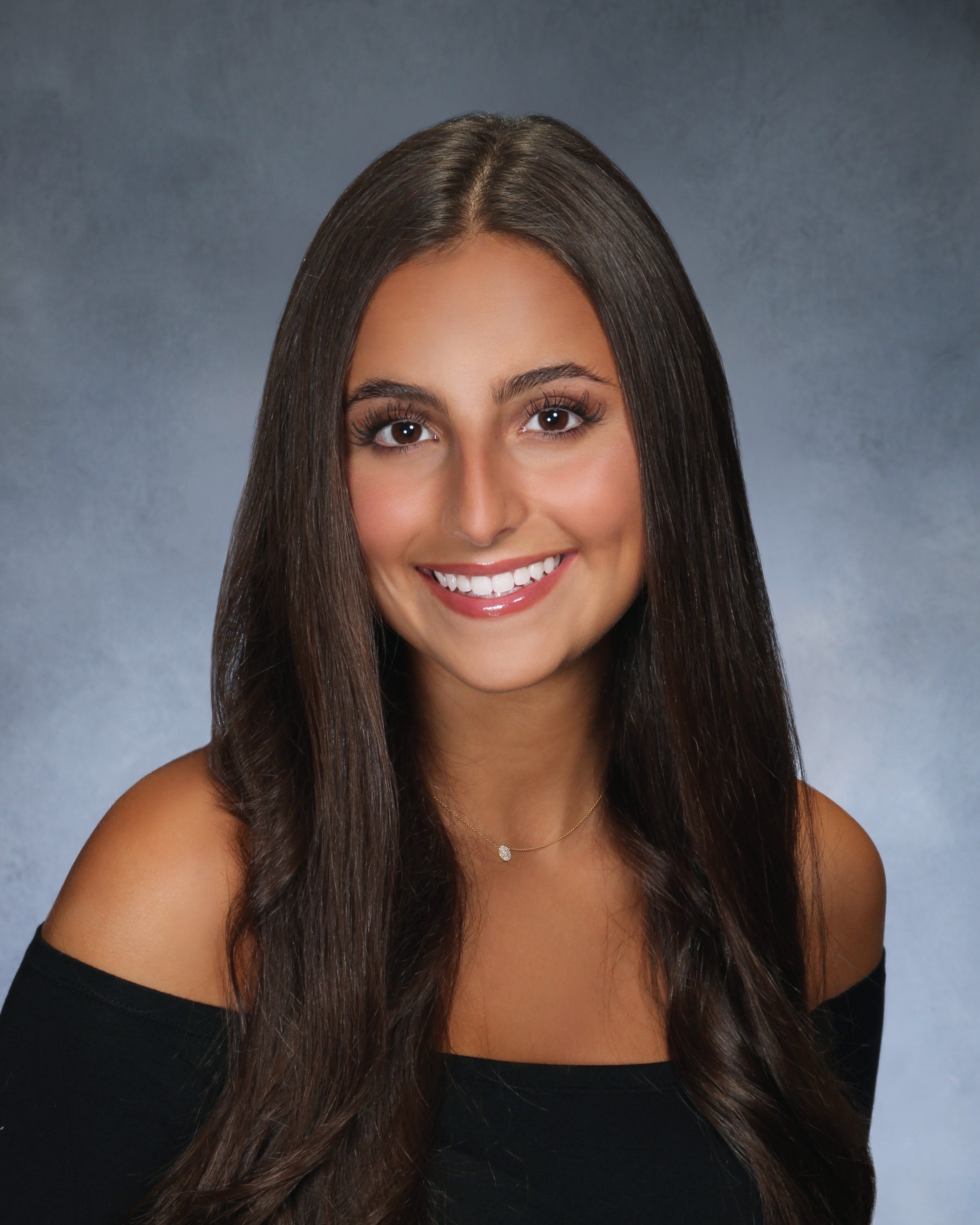 Sammy Slogoff smiling outdoors — personal photo